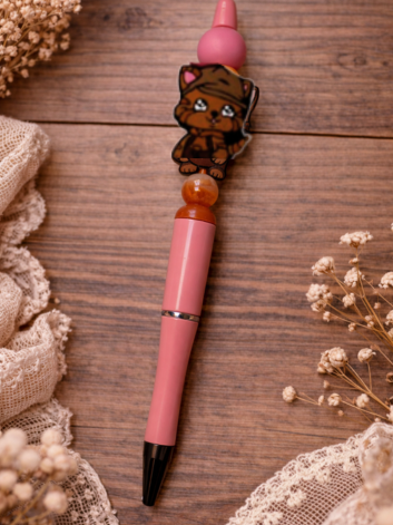 Coral Colored Beaded Pen with Brown Cat in Overalls and Pink Accent Beads